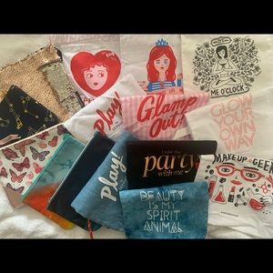 Assortment of various IPSY and Sephora bags